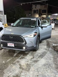 كورلا كروس موديل 2024  فئه XLE فول مواصفات  بدون رقم  حادثها باب و جام...