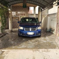 دوج كرفان موديل 2010  لون جويتي مكينة 3800 رقم بغداد تبريد 3 قطع والتف...