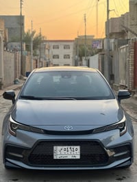 كورلا موديل 2021 لون سمنتي فول موصفات +بصمه + كشانه تدفئه تبريد+تحكمات...
