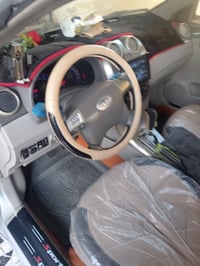 سياره بي وايدي كير اوتماتيك موديل 2011رقم بغداد بسمي تحويل ثاني يوم جا...