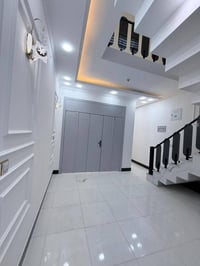 بيت 100م طابق ونص بناء درجة اولى  خلف مول بغداد  بناء بمواصفات حديثة  ...