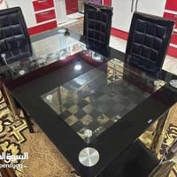 ميز طعام زجاج • 4 كراسي غلاف تعبان • بغداد الغزالية