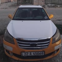 شيري e5 ٢٠١٤ خصوصي لون اصفر رقم اربيل    مكينه ٢٠٠٠ ابوالجف مكاني بغدا...