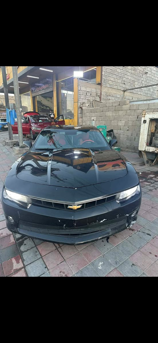 🔥

*للبيع شيفروليه كمارو RS 2014 🚗*

*اللون*: أسود مميز 🖤
*الموديل*: 2014
*الفئة*: RS (رياضي) 🏬
*المسافة*: 142,000 كم 🚀
*المحرك*: 3.6 V6 / 323 حصان ⚡
*القير*: أوتوماتيك 6 سرعات / دفع خلفي RWD 🚗
*المواصفات*:
- شاشة MyLink 📺
- أضوية HID + LED 🔦
- وياله 20 إنج RS 🔥
- تحكم ستيرن + كروز كونترول 🕹️
- نظام StabiliTrak + Traction Control 🚨

*الحالة*:
- ضرر: بنيد + جاملغ 🚧
- باب السائق: تعديل + صبغ بسيط 🛠️
- المحرك + الميكانيك: نظيف جدا 👍
- تمشي طبيعي 🚀

*السعر*: (110 ورقة ) سعر بي مجال للطيبين 💰

*للاستفسار*: (***********) 📞
