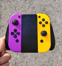 🎮 للبيع: Joy‑Con أصلي Nintendo Switch 🎮 🔹 زوج كامل (يمين + يسار) مع Gr...