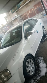 اوبترا 2014 نضيفة جدا  السونار مرفوق بصور اتصال على رقم 07727801777