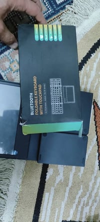 كيبورد+ ماوس لمس بلوتوث+ شحن  نازك وصغير وقابل للطوي.. سعره 15000 الف ...