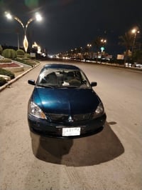 لانسر • ٢٠١٠ • اوتوماتيك