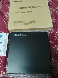 قارئ أقراص • حاسبة • جديد