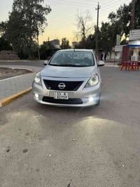 للبيع نيسان سني هندي ٢٠١٣لسيارة جاهزة من كلشي رقم بغداد بسمي هزة جديدة...