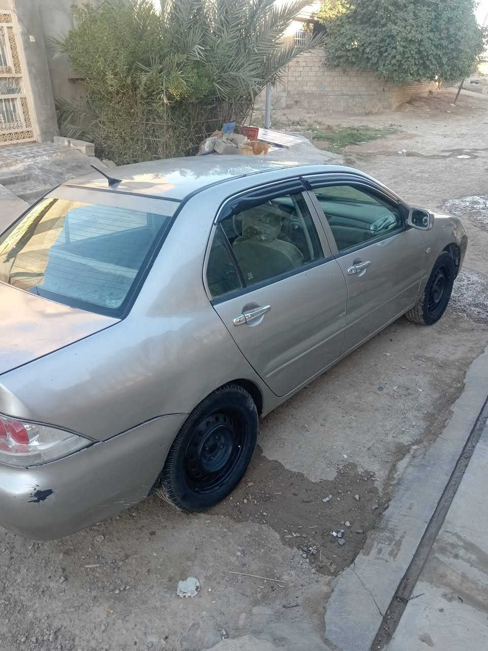 سلام عليكم لانسر موديل 2008 مصبوغه حزام الجماليه 68 بيه مجال ***********
