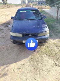 كيااسيفياا رقم بغداد بسمي سياره مكفوله محرك وكير ودواخل كلش نضيفه 0787...