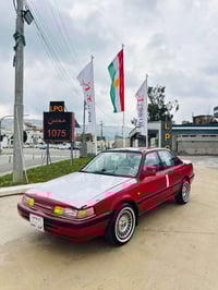 مازدا • ١٩٩١ • كويسينجاك