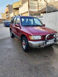 سياره كيه سبورتج موديل 1993 كيه نضيفه بمعنه الكلمه كير ومكينه جديد تخم...