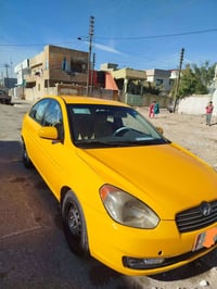 اكسن • ٢٠١٠ • توماتيك غاز