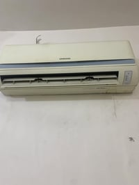 سبلت نوع سامسونك 1طن شغال وعلى الفحص 200 وبي مجال بسيط07827522281