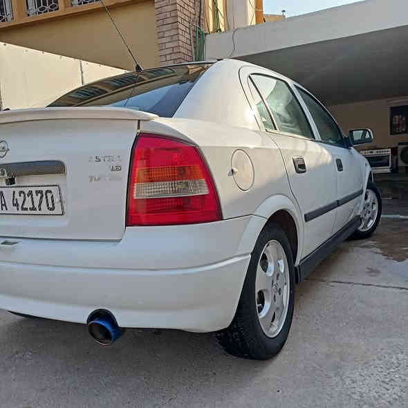 السلام عليكم اخوان -- للبيع اوبل استرا 2002 السيارة بلاديه لاصبغ ولاتبديل فقط جراد بالبنيد  كهربائياتها بلاديه باتري جديد بي ضمان سنه تخم تايرات جديد تبريد شغال  داخل نضيف جدا گير جديد المكينه 1600مسكر بيها تنقيص دهن قليل --- السيارة باسمي تحويل مباشر  رقم بغداد الانكليزي الجديد // السعر 60 وبيها مجال // *********** هذا رقمي بي واتساب
