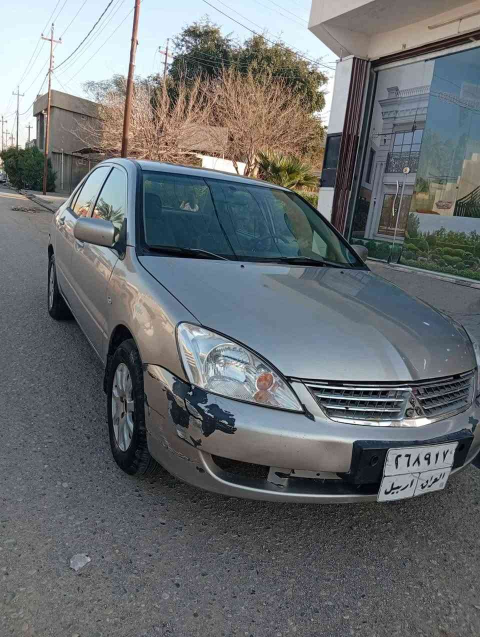 ليدراوي كه مي هه يه له به شي پشته وه 
ته قه و ره قه و گيرو مه كينه ي به شه رت 
بؤياغ عامه له سه ر كال بونه وه 
2010ي مه كينه گه وره يه 
ژ.م ***********
*********** Singapore
