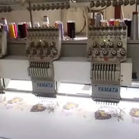 مكينة تطريز الكتروني للبيه موديل 2008  بيها 10 رؤوس تطريز و كل راس بيه...