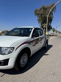 ميسيبوشي L200 • ٢٠١٥ • محرك ٢٤٠٠