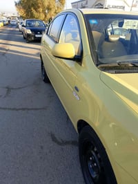 اكسنت • تكسي بغداد • مؤسسه ١٦٠٠