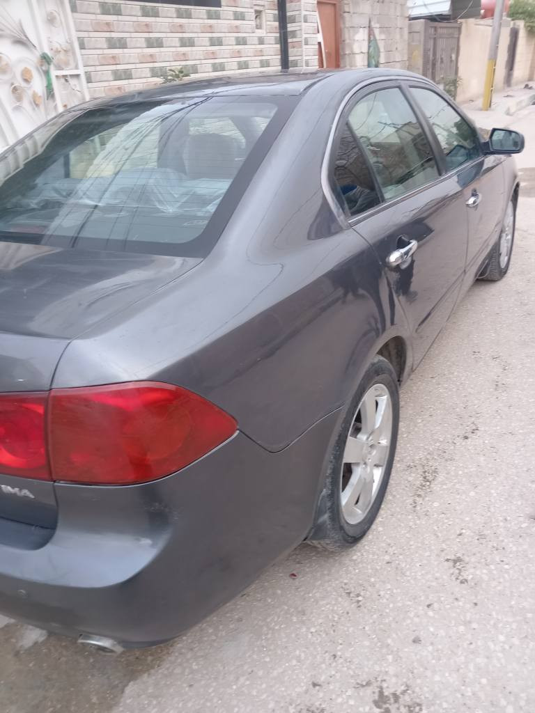 اوبتيمه موديل ٢٠٠٦ سته سلندر  صبغ اربع قطع مع القماره ضربه خفيفه بيها ومعمره سياره ماتبين.. كها جاهزه كير اوتو محرك تبريد حداديه تخم تاير تحكم استيرن كهربائيات سياره مافتوح بيها برغي بلاد جديده سعرها ٧٨ مجال بيها بسيط مكانها كربلاء  تفون صاحبها ***********.. *********** كربلاء, العراق
