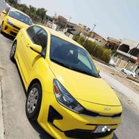 للبيع كيا ريو وارد امريكي تكسي موديل 2022 ضراها واضح بل صور ماشي 100مي...