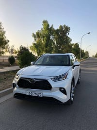 هايلندر 2023 لمتد لون ابيض رقم بغداد كير اتوماتيك 8سرع/ محرك 2400 تيرب...