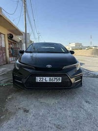 كورلا موديل 2023 وارد امريكي اللون اسود فول مواصفات عدا الفتحة بصمة  د...