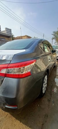 نيسان سنترا وراد امريكي موديل 2014 حادث خشم لبنيد فقط وبيه 3 قطع صبغ ا...