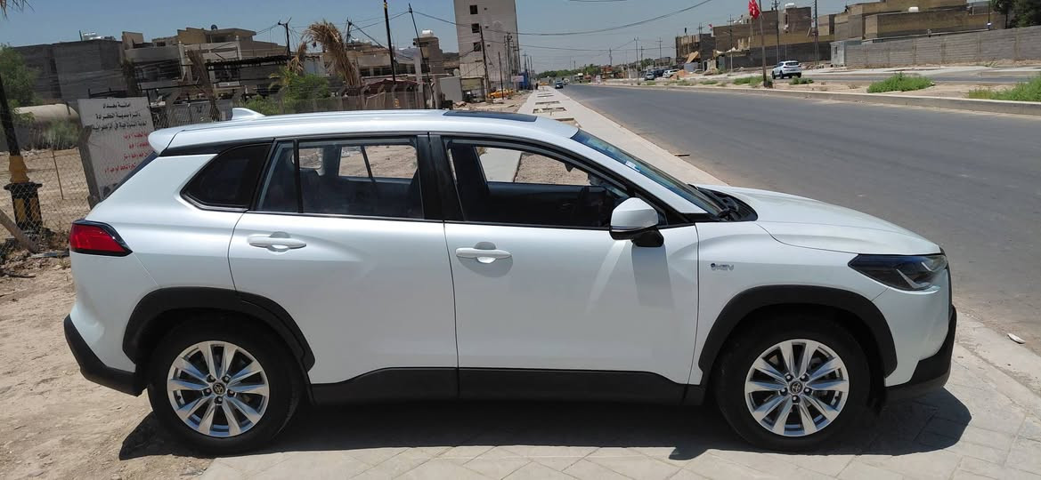 كورلا كروس 2025 
مكينه 2000cc بانزين+كهرباء 
فول موصفات 4 كامرات  360 درجه 
رادار امامي فتحه سقف
تحديد مسار .مثبت سرعه .تحكمات تحكمات ستيرن جهتين.  اوتو هولد .هاند بريك دكمه . 3 وضعيات قياده .  4 جامات +فتحه السقف اوتو . داخل لونين . تبريد قطعتين . بصمه ابواب . بصمه تشغيل عدد 2.
عداد الكيلوات  74000 
بارد خشم البنيد وصبغ عله كده +بارد ب قبق الجنه وصبغ ع كده 
الباقي وكاله 
 اماكن بسيطه وصورهن مووجودات مكان السياره الزعفرانيه 
*********** بغداد, العراق
