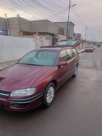 اوميكا بزون • ١٩٩٥ • باسمي