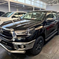 تويوتا هايلوكس (2023)آسود شركه ساز الضمان 4سلندر (2700)فور ويل فول موا...