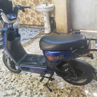 دراجة شحن كهربائية • ٥ بطاريات • بصمتين