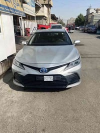 كامري LE موديل 2024 هايبرد🌀تكسي دبي  بيها حادث الصندوق فقط السياره غني...