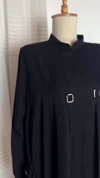 براند كويتي • ملابس