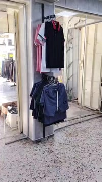 الشرطه الرابعه • قرب مجمع النبأ • ملابس