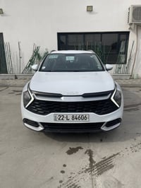 كيا سبورتج موديل 2024 مكفوله من الصبغ ماشيه 24 الف الموصفات بصمه تشغيل...