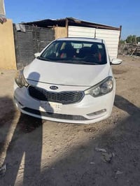 سيراتو 2015 مكفولة من الصبغ والتبديل بيها رصعتين صغار فقط كير محرك صدر...