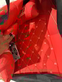 دوشمه سياره لون احمر ملكي جديده ممستخدمه ب٥٠ مكاني بغداد الدولعي ٠٧٧٧٢...