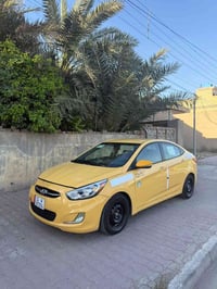 اكسنت موديل 2016 محرك 1600كير وتماتيك رقم بغداد نكليزي مصفره هيه وغرام...