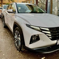 ‏هونداي توسان  موديل ٢٠٢٤ اللون أبيض ضمان الشركة الأولى ‏الرقم بغداد ا...