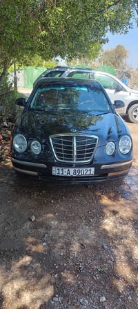 للبيع كيا امانتي 2006فول عدا البصمه كيرمكينه جددصدرامامي خلفي جديد بيه...