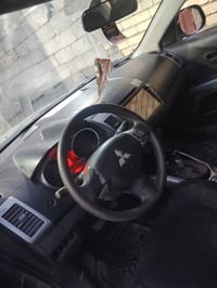 سياره مستيبوشي موديل 2007 بيها ظربه بنيد وبابين بغداد نهروان 078080557...