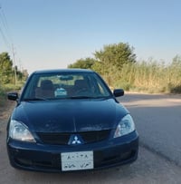 لانسر 2008 • مكينة 2000 • رقم شمالي