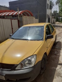مسيوبيشي لانسر موديل 2007 تكسي للبيع رقم بغداد الانكليزي الجديد  سيارة...