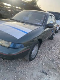 كيه سيفيا موديل ٩٣مصبوغه.عام بدون ظربه جاهزه رقم بغداد إنكليزي محرك مف...