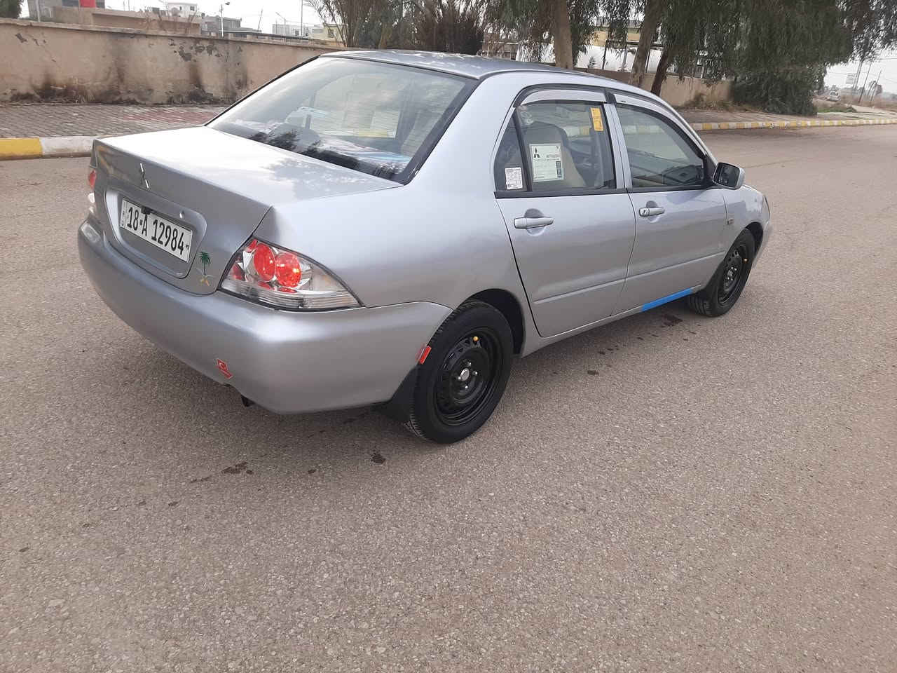 سلام عليكم لانسر ٢٠٠٦ رقم بابل انكليزي بسمي مشروع وطني مكينة 1600 قبق اسود كير مكينة شاشه كامره مكفولات جدد تبريد تدفئة شغال حدادية خير من الله سيارة  جديدة احلة من صور ستفسار ((***********)) ( السعر 58 وبيهة مجال سيارة كاملة مابيهة اي نقص مصبوغه عام جماليه فقط سيارة جديدة جديدة مكان سيارة ديالئ السلام
