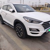 توكسان خليجي ابيض موديل ٢٠٢٠ رقم اربيل باسمي  المواصفات  بصمة تشغيل وب...
