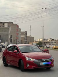 (مكلف بالنشر) هونداي النترا 2020 وارد امريكي لون احمر رقم بغداد نص موا...